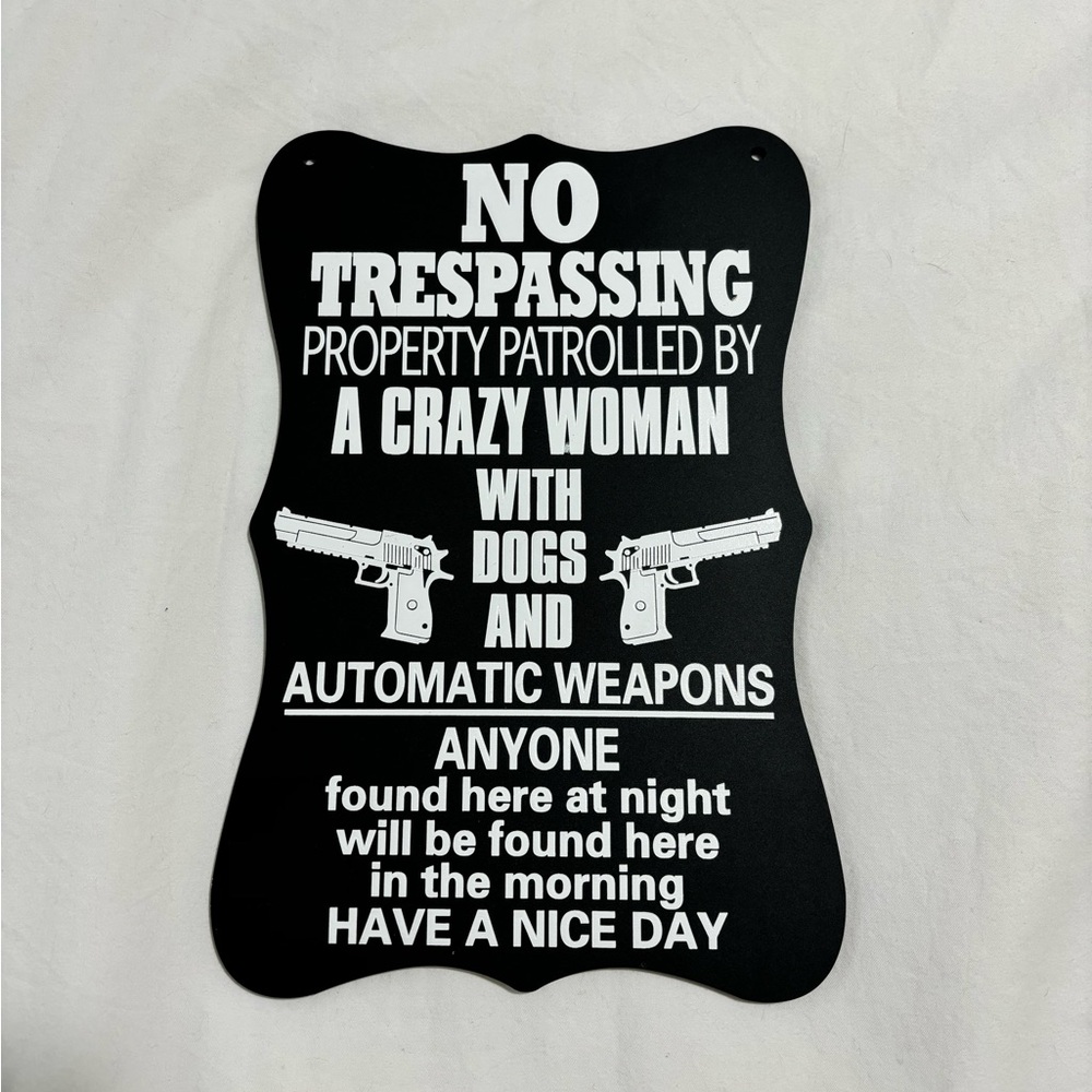 Funny Woman’s No Trespassing Sign